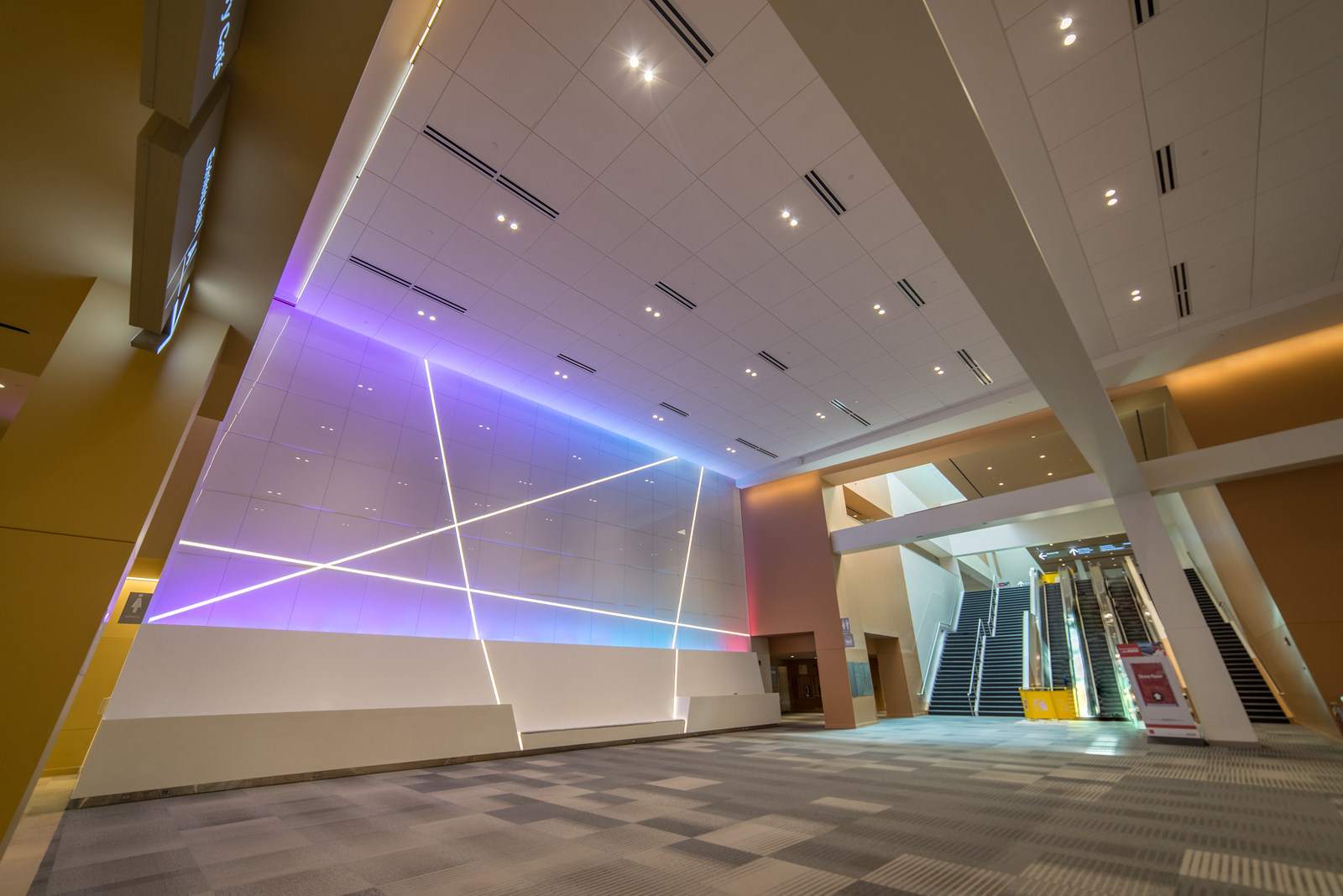 Columbus Convention Center concourse node wall Full-height back painted glass node wall in the Greater Columbus Convention Center concourse with purple LED backlight, shop drawings by MP Drafting