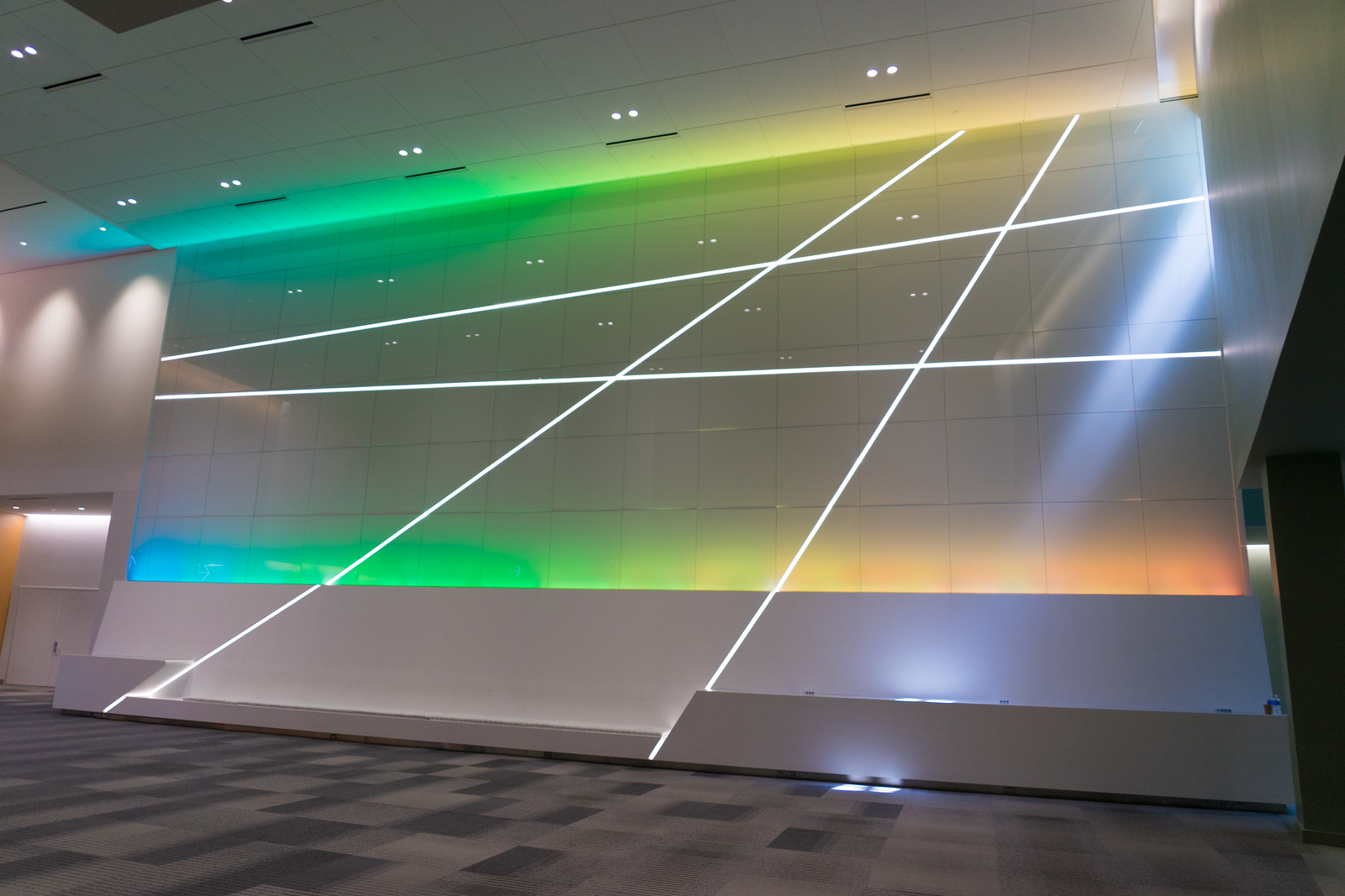 Columbus Convention Center back painted glass node wall Back painted glass node wall at the Greater Columbus Convention Center with diagonal LED light lines and color-changing backlight, shop drawings by MP Drafting